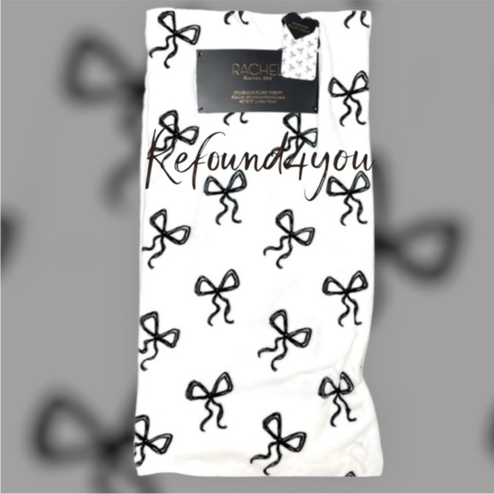Rachel Roy - ‘Bows - Black’ plush throw. 60” x 70“. NWT.